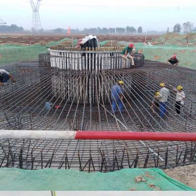 Disclosed is a wind turbine generator foundation with pressure-dispersive pre-stressed anchor rods or anchor ropes.